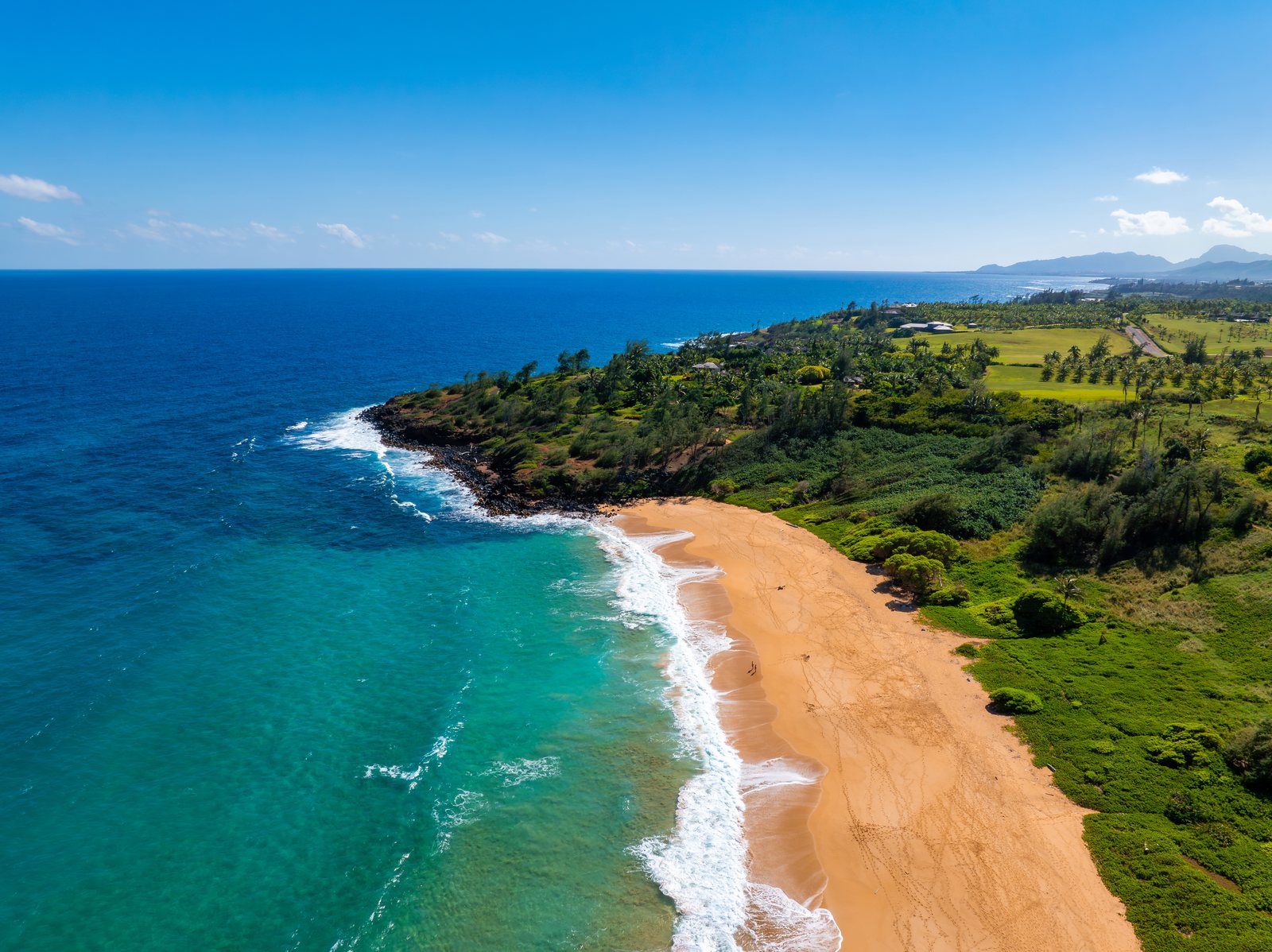Donkey Beach (Pālikū) from the air, looking south along the East Side