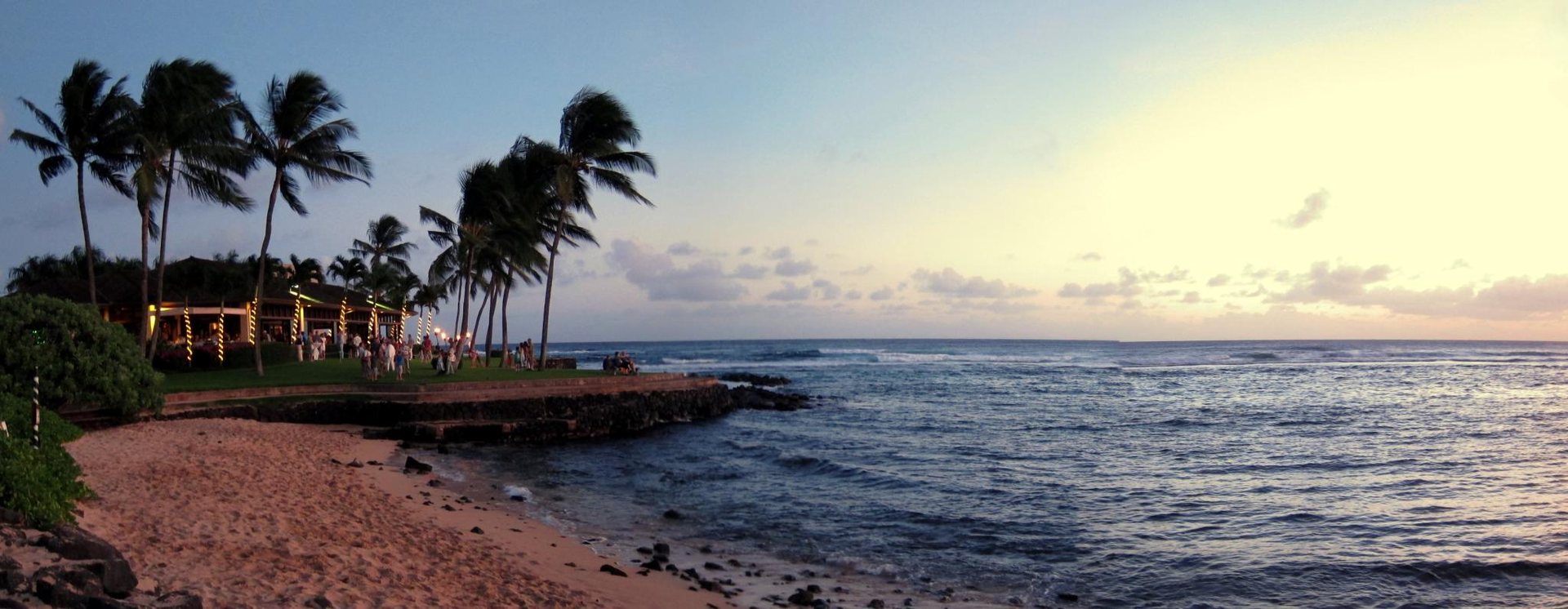 Lāwaʻi Beach and the Beach House lawn at dusk